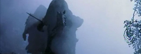 The Ring Wraiths appear through the fog